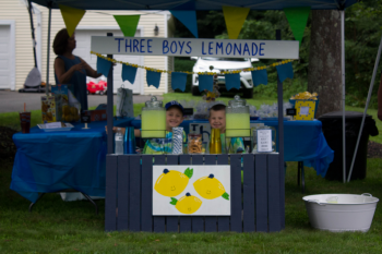 past photo of 3  boys lemonade stand