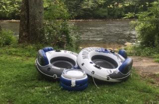 tubes waiting for riders by the Farmington River