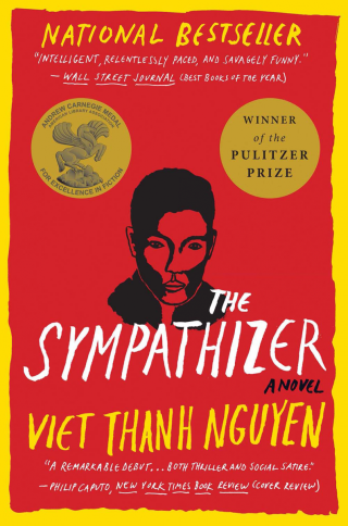 red book cover of The Sympathizer featuring a person's face