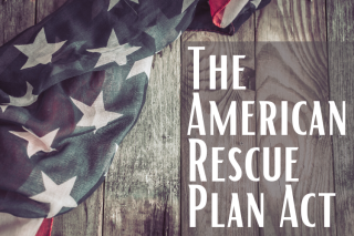 flag draped next to words The American Rescue Plan Act